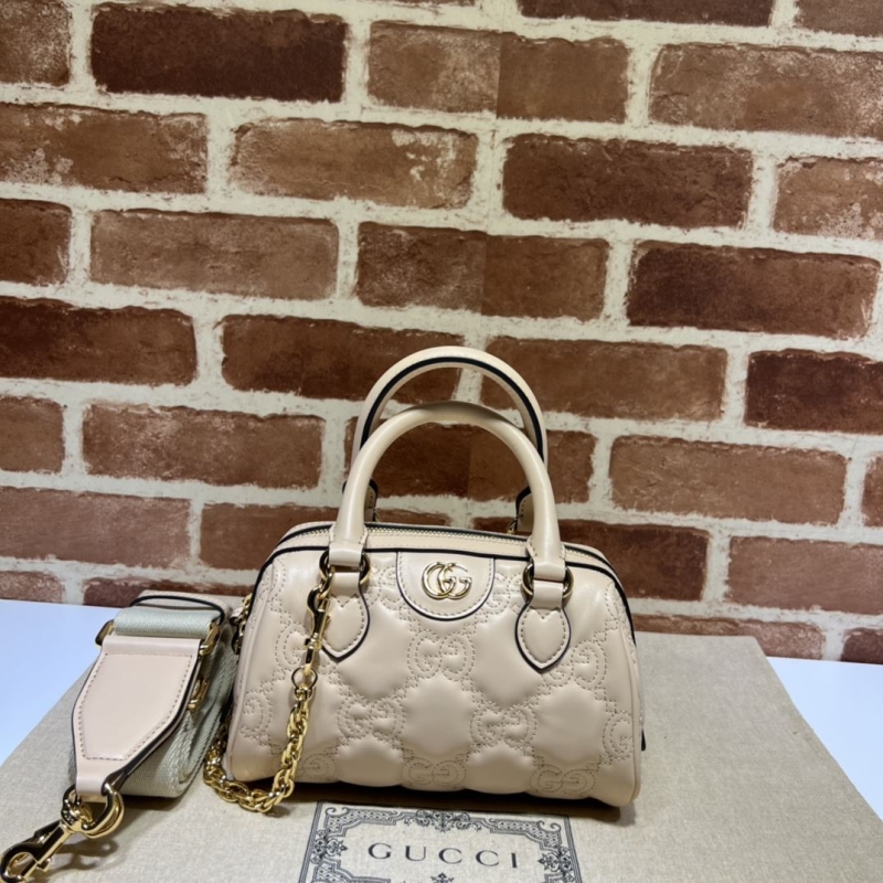 G*u*i top handle bags